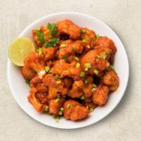 Cauli Manchurian Classic (Vegan) · Cauliflower mixed in batter and fried and sauteed in sauce