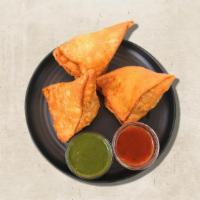 Mixed Veggie Turnovers (Vegan) · Thin crust of flour filled with savory potato and deep fried.