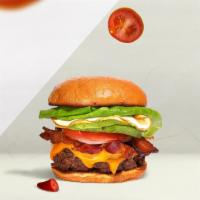 Wake & Bacon Egg Burger · Angus beef patty with melted Cheddar cheese, bacon, fried egg, avocado, shredded romaine, to...