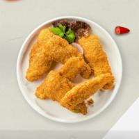 The Classic Tenders · Fried chicken tenders with classic seasoning, served with fries and your choice of sauces.