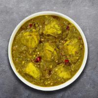 Chicken Saag · Boneless chicken cooked with blended Indian spices and spinach sauce.