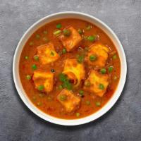 Matar Paneer · Green peas and home made cheese cubes cooked with creamy sauce.