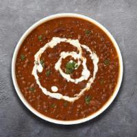 Dal Makhani · A popular dish from Punjab region made with whole black lentil, red kidney beans, butter and...