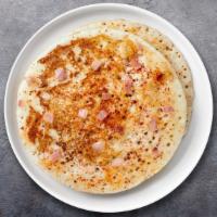 Custom Uthappam · A fluffy Indian pancake made with rice and lentil batter. Any 3 Toppings: Chilli, Onion, Tom...