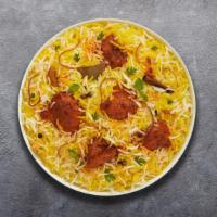 Hyderabad Chicken Dum Biryani · A mixture of aromatic basmati rice, Indian herbs, tender pieces of chicken and our famous Hy...