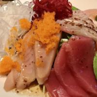 Sashimi Salad · Tuna, salmon, yellow tail, albacore & white fish on spring mix with ponzu & sesame dressing.