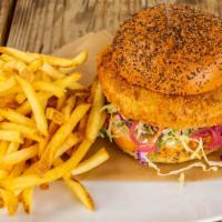 Fish Burger · Fried or pan seared - slaw, pickled onion, house made tartar sauce on a salt and pepper bun.