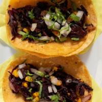 Jamaica Tacos (2) · Hibiscus flower sauteéd with onions and serrano peppers, topped with grilled corn, cilantro,...
