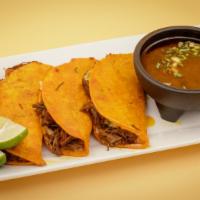 3 Queso  Birria Tacos And Conzome 8Oz · Red sauce beef stew taco with cheese, onion and cilantro and conzome.