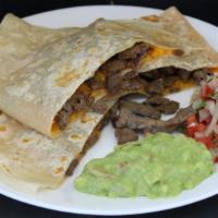 Quesadilla With Choice Of Meat · Quesadilla with choice of meat. Includes pico de gallo and guacamole on the side.