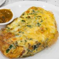 Santa Fe Omelette With Cheese · Zesty southwestern omelette with a medley of fresh onions, cilantro, tomatos, and jalapeño p...