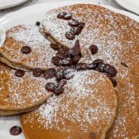 Chocolate Chippies · Chocolate melted into pancakes and then topped with chocolate morsels; dusted with powdered ...