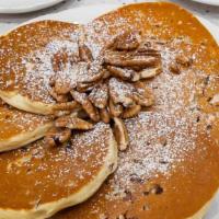 Georgia Pecan Pancakes · Tender Georgia pecans inside and out; dusted with powdered sugar and served with whipped but...