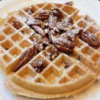 Georgia Pecan Waffle · Tender pecans cooked inside; dusted with powdered sugar, and yes, more pecans, served with w...