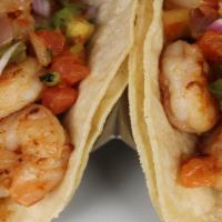 Shrimp Tacos · Three grilled shrimp tacos with pico de gallo and mama's special chipotle sauce. Served with...