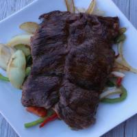 Carne Asada · Eleven ounce tender skirt steak dish that is commonly prepared in the northern and western p...
