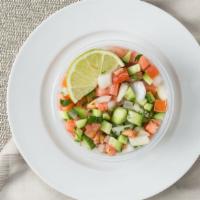 Shirazi Salad · Combination of fresh chopped cucumbers, tomatoes, parsley, onions with virgin olive oil and ...