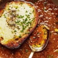 French Onion Soup · traditional beef stock with caramelized onion, gruyere cheese, giant herbed crouton.