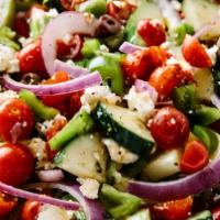 Greek Salad · Crisp romaine lettuce, red onion, black olives, green peppers, fresh tomato and feta cheese ...