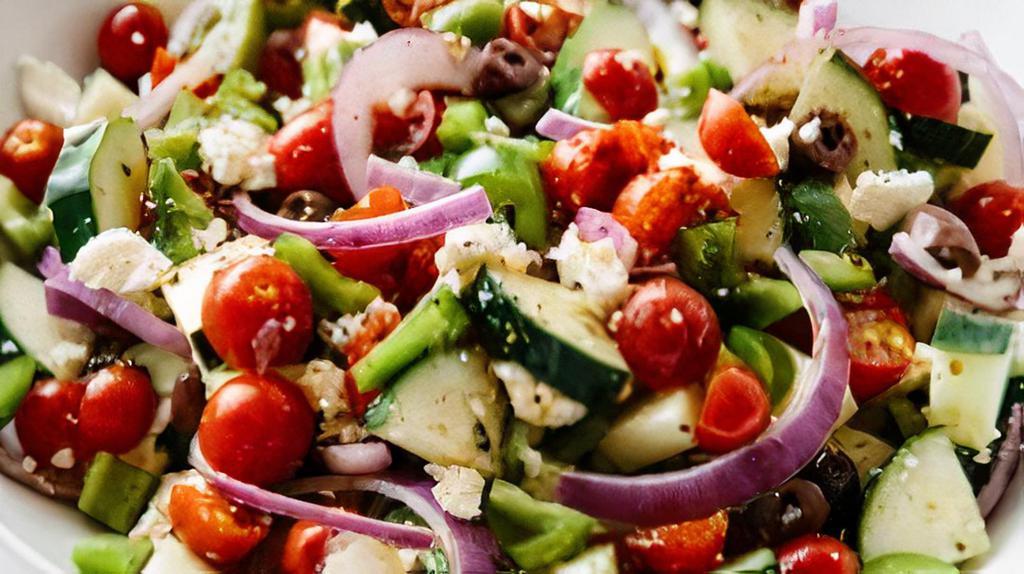 Greek Salad · Crisp romaine lettuce, red onion, black olives, green peppers, fresh tomato and feta cheese with special house made dressing (olive oil, oregano and lemon juice). Choice of avocado, grilled chicken breast or lightly breaded chicken tenders. 180-280 Cal.