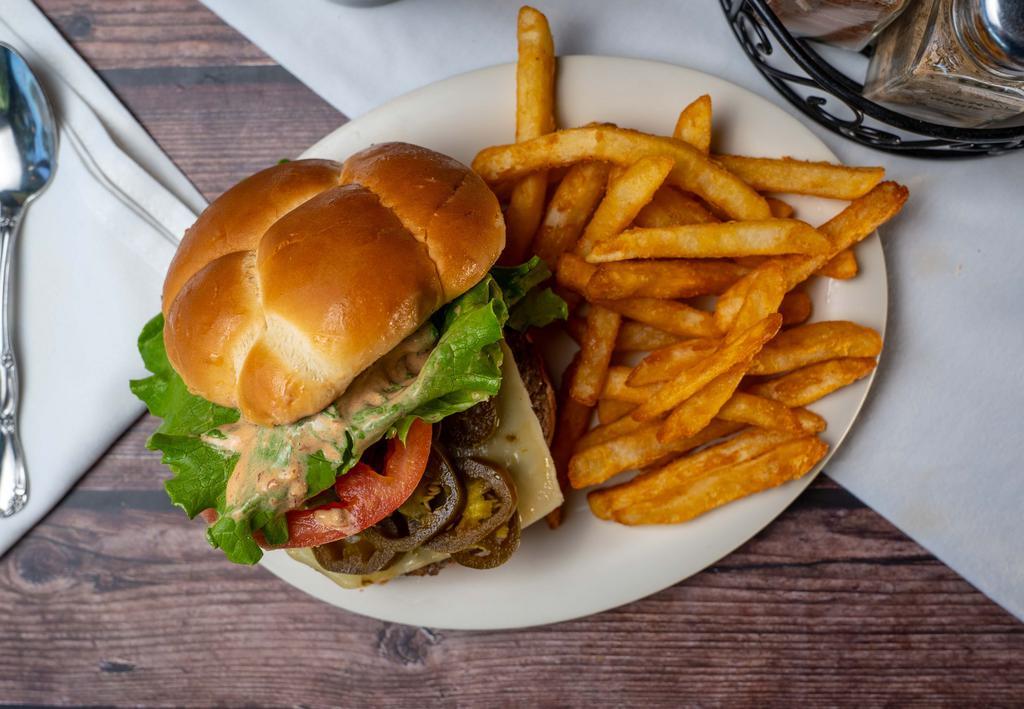 Spicy Jack Burger · Spicy jalapeno, pepper jack cheese, crisp lettuce, fresh tomato and our smokin' chipotle ranch. Made with fresh 100% certified angus beef and served with choice of side. Spicy.