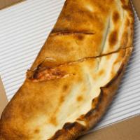 Calzone · Our famous crust stuffed with mozzarella cheese, choice of sauce and two stuffings.