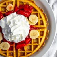 Fruit Waffles · A delicious golden waffle with your choice of fruit topping strawberry banana, peaches and p...