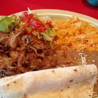 Carnitas · Served with rice beans and tortillas.