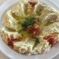Baba Ghanouj · Vegetarian. Fire roasted eggplant dip served with pita.