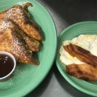 French Toast Combo · French toast, with 2  eggs any style and your choice of (2) strips of bacon or (2) sausages.