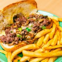 Philly Cheesesteak Sandwich · Slices of top sirloin grilled with mushrooms, onions, bell peppers, and Jack cheese served o...