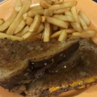 Patty Melt Sandwich · Served on rye bread with grilled onions. Comes with a side.
