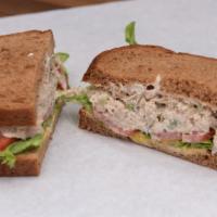 Tuna Salad · House-made tuna salad, mayo, mustard, lettuce, tomato, red onion on whole wheat bread. Add a...