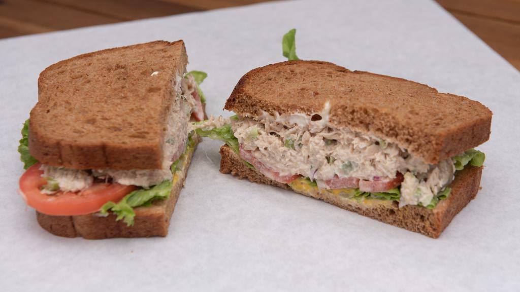 Tuna Salad · House-made tuna salad, mayo, mustard, lettuce, tomato, red onion on whole wheat bread. Add avocado mash, bacon for an upcharge.
