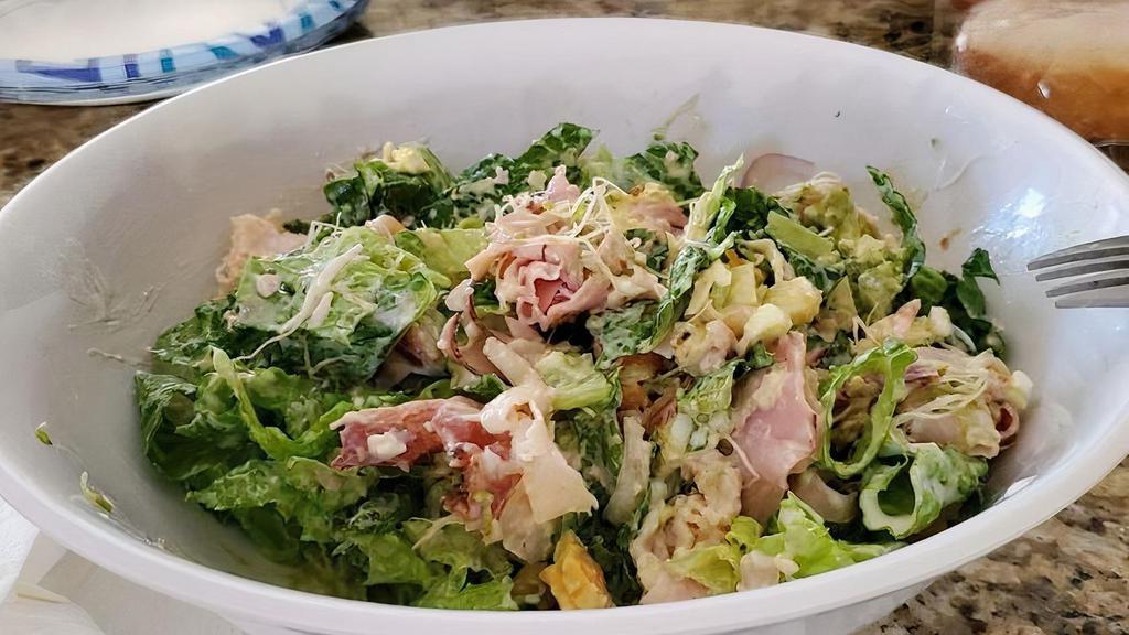 Chef Salad · Fresh lettuce mix, sprouts, tomato, red onion, egg, bacon, ham, turkey, diced Swiss and cheddar cheeses. Add avocado for an upcharge.