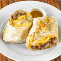 Breakfast Burrito · flour tortilla, 2 eggs, sausage,cheddar cheese, potato, and tomatillo salsa