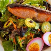 Miso Salmon Salad With Carrot Ginger Dressing · miso glazed salmon served over baby kale, spiced pickled cucumbers, beet pickled egg, spiced...