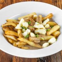 Poutine · French fries, veggie gravy, and cheese curds