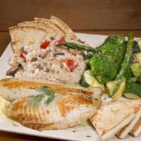 Salmon Plate · Grilled fresh salmon fillet served with risotto, steamed veggies, pita bread, and a drizzle ...