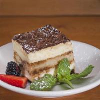 Tiramisu · Layers of espresso drenched with lady's fingers, separated by mascarpone cream, and dusted w...