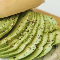 Avocado Bagel · Plain bagel with cream cheese mixed with dill and capers, sliced avocado and black pepper