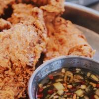 Southern Fried Chicken Bites · Honey dipping sauce.