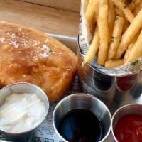Whaler Fish & Chips · Beer battered Alaskan cod, fries, and homemade tartar sauce.