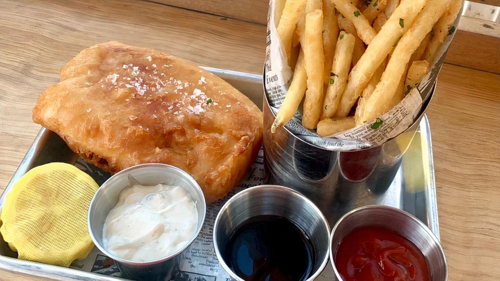 Whaler Fish & Chips · Beer battered Alaskan cod, fries, and homemade tartar sauce.