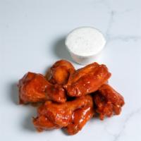 Wingin Clucker • 6Pc · Six jumbo wings tossed in our signature buffalo sauce with ranch on the side

• served with ...