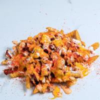Loaded Fries · Seasoned French fries with two large diced chicken tenders, topped with cheese, spicy aioli ...