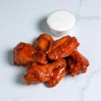 6 Wings · Six jumbo wings tossed in our signature buffalo sauce with ranch on the side