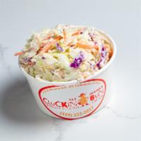 Coleslaw · Shredded cabbage and carrots with classic sauce