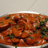 Mushroom Masala · Vegan. Fresh mushroom cooked with tomatoes, herbs, and spices in rich curry sauce.