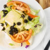 Garden Salad · Iceberg lettuce red-cabbage carrots olives and tomatoes